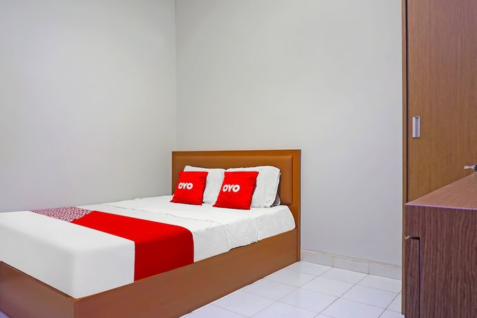 Imagen de la habitación del Hotel Capital O 92180 Orange Garden 47. Foto 2