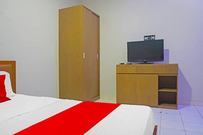 Imagen de la habitación del Hotel Capital O 92180 Orange Garden 47. Foto 4