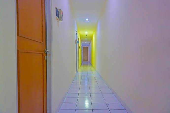 Imagen de los interiores del Hotel Capital O 92180 Orange Garden 47. Foto 14