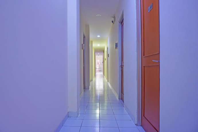Imagen de los interiores del Hotel Capital O 92180 Orange Garden 47. Foto 15