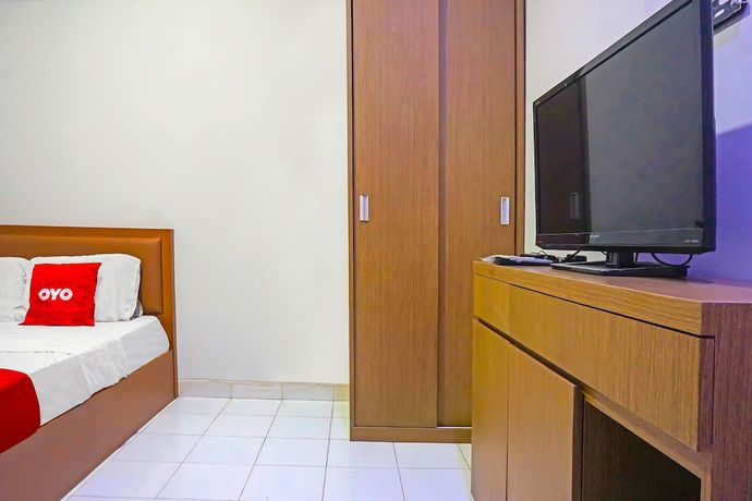 Imagen de la habitación del Hotel Capital O 92180 Orange Garden 47. Foto 5