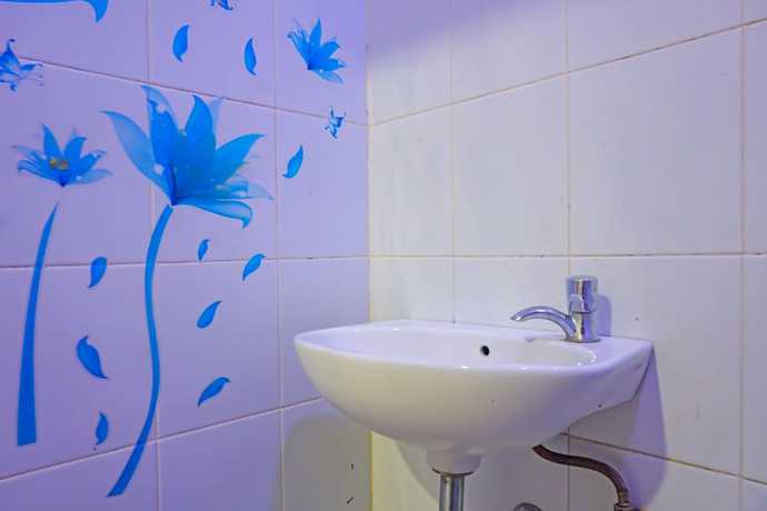 Imagen de la habitación del Hotel Capital O 92180 Orange Garden 47. Foto 8
