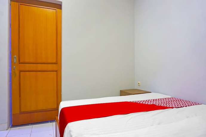 Imagen de la habitación del Hotel Capital O 92180 Orange Garden 47. Foto 11