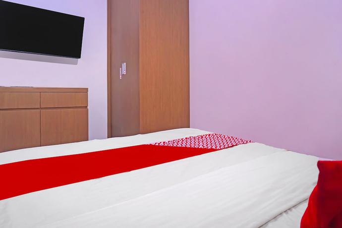Imagen de la habitación del Hotel Capital O 92180 Orange Garden 47. Foto 12