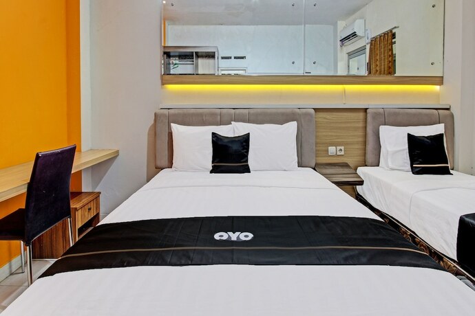 Imagen de la habitación del Hotel Capital O 92295 Double Tree. Foto 16