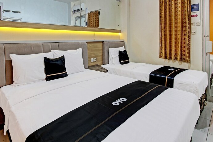 Imagen de la habitación del Hotel Capital O 92295 Double Tree. Foto 18