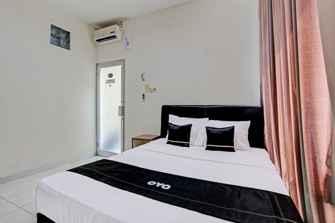 Imagen de la habitación del Hotel Capital O 92295 Double Tree. Foto 19