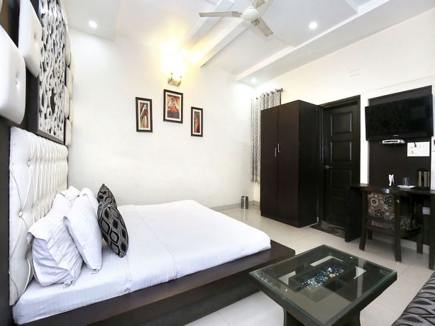 Imagen de la habitación del Hotel Capital O 9235 Nayyar. Foto 4