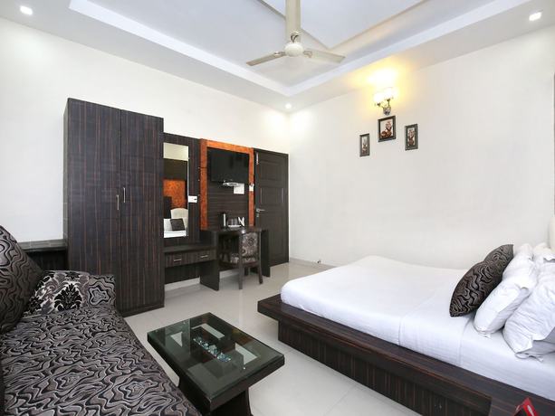 Imagen de la habitación del Hotel Capital O 9235 Nayyar. Foto 10