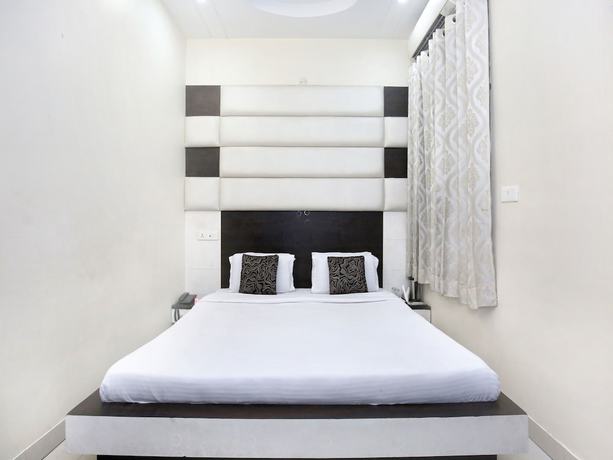 Imagen de la habitación del Hotel Capital O 9235 Nayyar. Foto 12