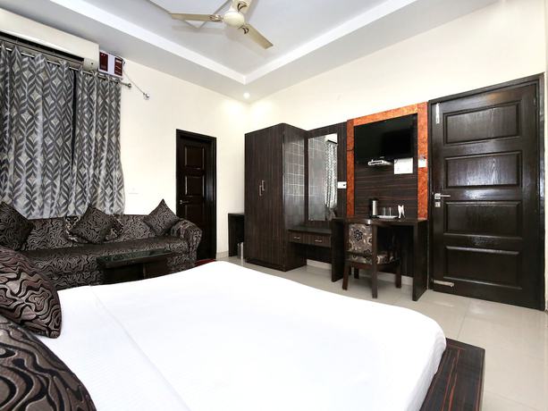 Imagen de la habitación del Hotel Capital O 9235 Nayyar. Foto 14