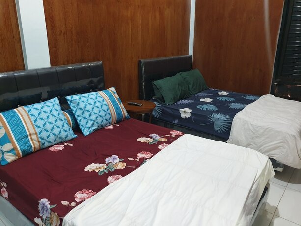 Imagen de la habitación del Hotel Capital O 92612 Penginapan D\'alas Purwo and Beach. Foto 17