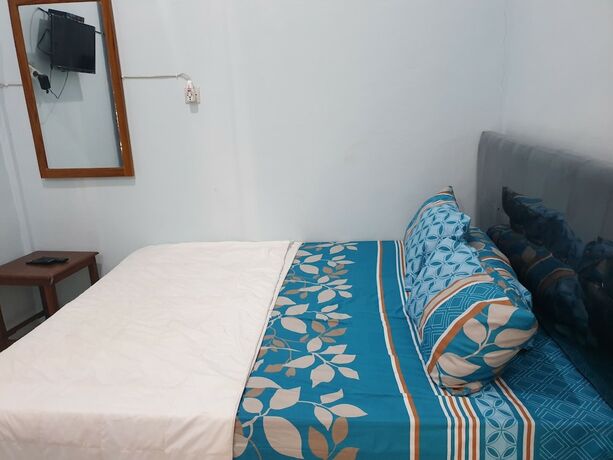 Imagen de la habitación del Hotel Capital O 92612 Penginapan D\'alas Purwo and Beach. Foto 18