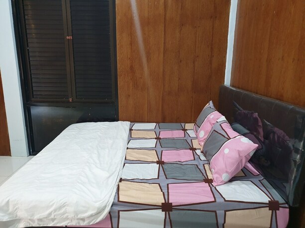 Imagen de la habitación del Hotel Capital O 92612 Penginapan D\'alas Purwo and Beach. Foto 19