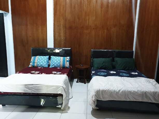 Imagen de la habitación del Hotel Capital O 92612 Penginapan D\'alas Purwo and Beach. Foto 20