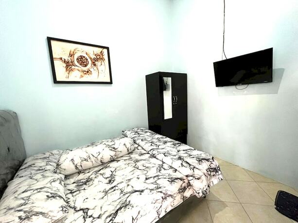 Imagen de la habitación del Hotel Capital O 92615 Villa Utama D\'alas Purwo. Foto 18