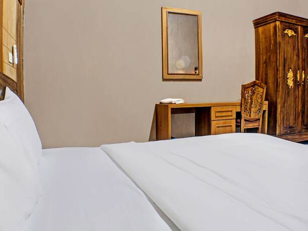 Imagen de la habitación del Hotel Capital O 92681 Randu Mas and Resort Taman Purbakala. Foto 19