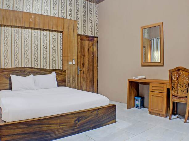 Imagen de la habitación del Hotel Capital O 92681 Randu Mas and Resort Taman Purbakala. Foto 20