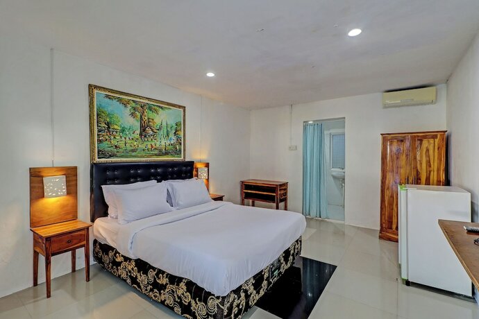 Imagen de la habitación del Hotel Capital O 92728 Kos 168. Foto 17