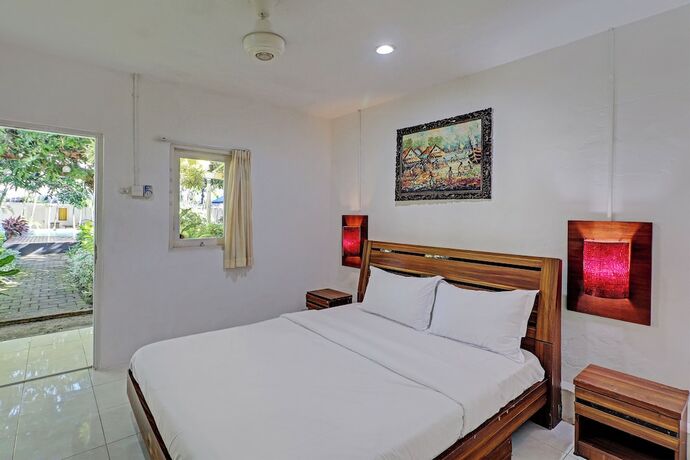 Imagen de la habitación del Hotel Capital O 92728 Kos 168. Foto 18