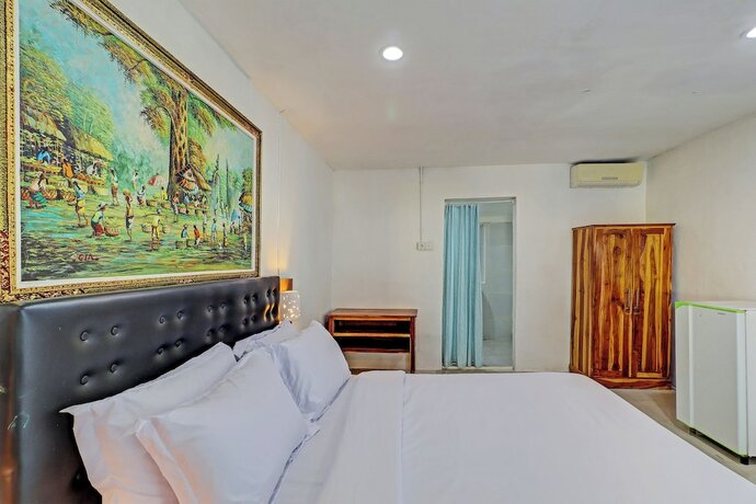 Imagen de la habitación del Hotel Capital O 92728 Kos 168. Foto 19