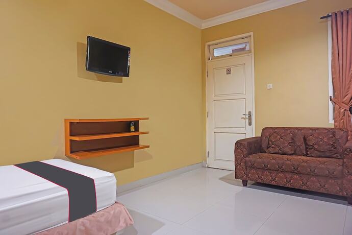 Imagen de la habitación del Hotel Capital O 92836 Villa Kampoeng Katineung. Foto 16