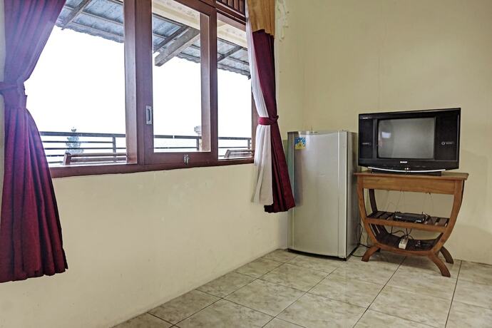 Imagen general del Hotel Capital O 92867 Villa Raggal. Foto 12