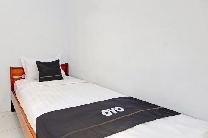 Imagen de la habitación del Hotel Capital O 92929 New Tirta Kencana Syariah. Foto 17