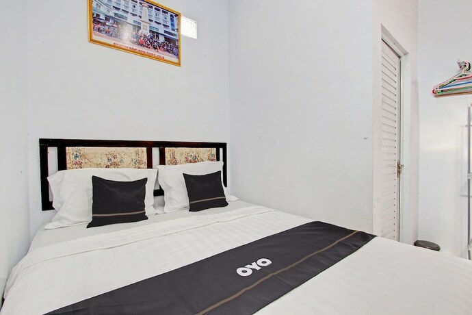 Imagen de la habitación del Hotel Capital O 92929 New Tirta Kencana Syariah. Foto 19