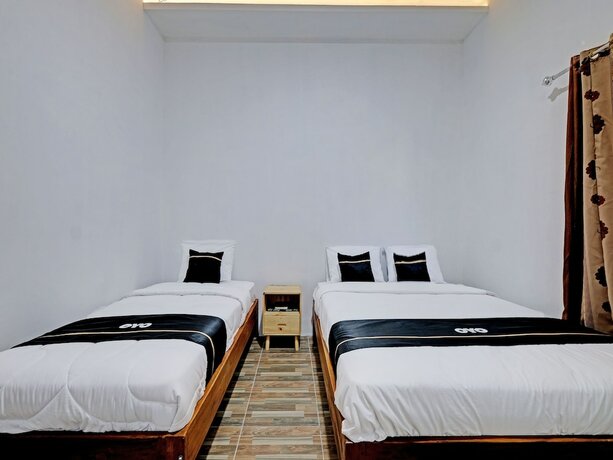 Imagen de la habitación del Hotel Capital O 92963 Global House Syariah. Foto 16