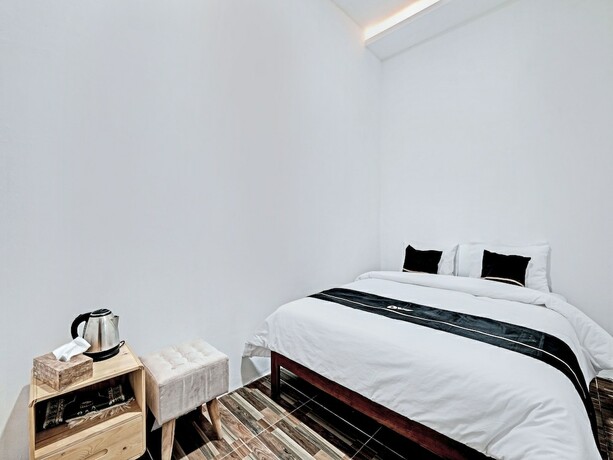 Imagen de la habitación del Hotel Capital O 92963 Global House Syariah. Foto 17