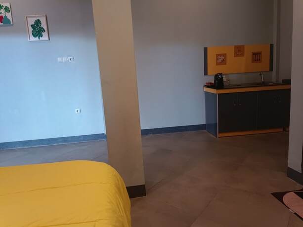 Imagen de la habitación del Hotel Capital O 93118 Asera Homestay. Foto 19