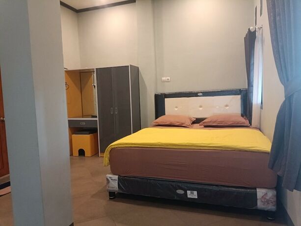 Imagen de la habitación del Hotel Capital O 93118 Asera Homestay. Foto 20