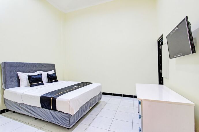 Imagen general del Hotel Capital O 93204 Mulia Dua Syariah. Foto 8