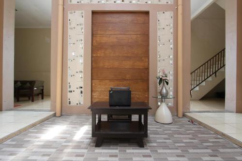 Imagen general del Hotel Capital O 93204 Mulia Dua Syariah. Foto 4