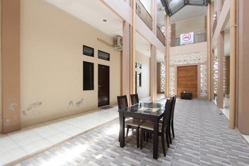 Imagen general del Hotel Capital O 93204 Mulia Dua Syariah. Foto 10