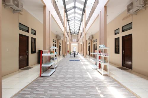 Imagen general del Hotel Capital O 93204 Mulia Dua Syariah. Foto 12