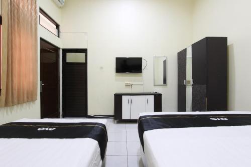 Imagen general del Hotel Capital O 93204 Mulia Dua Syariah. Foto 14