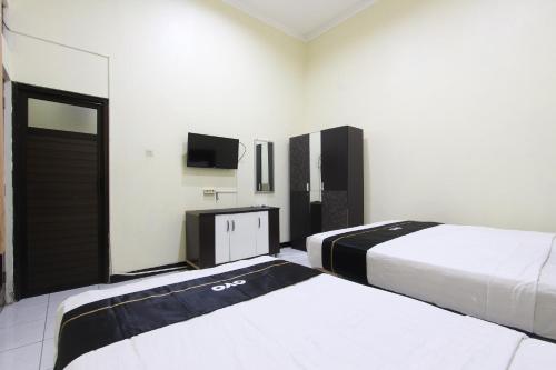 Imagen general del Hotel Capital O 93204 Mulia Dua Syariah. Foto 17