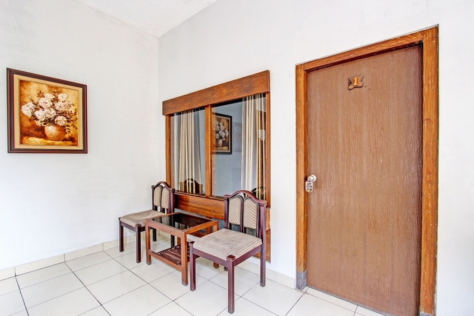 Imagen de los interiores del Hotel Capital O 93240 Candra Dewi. Foto 16