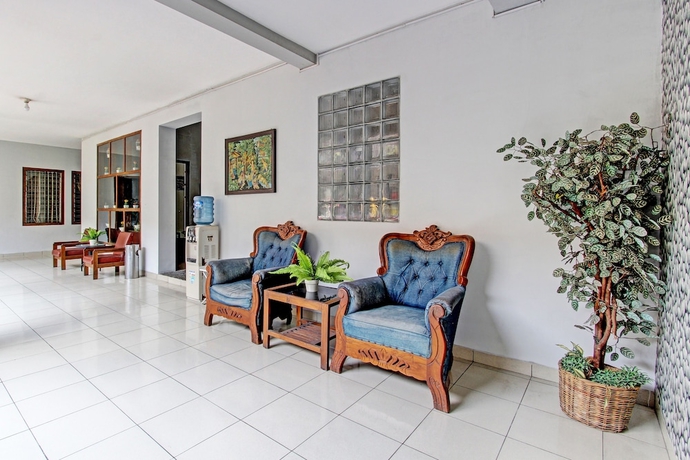 Imagen de los interiores del Hotel Capital O 93240 Candra Dewi. Foto 17