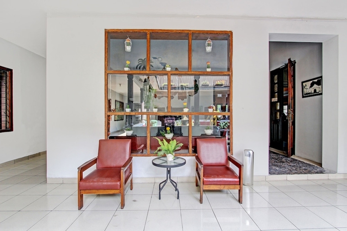 Imagen de los interiores del Hotel Capital O 93240 Candra Dewi. Foto 18