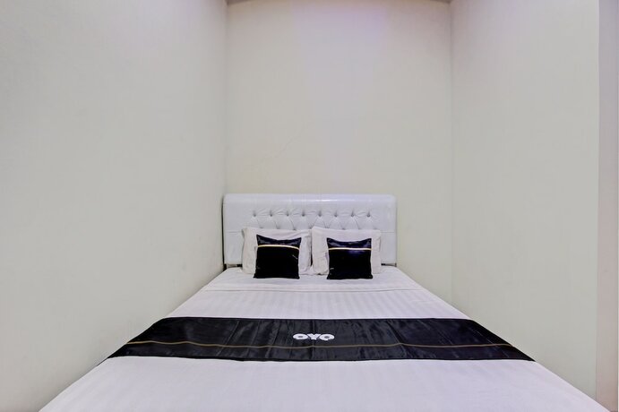 Imagen de la habitación del Hotel Capital O 93244 Angkasa Inn. Foto 20