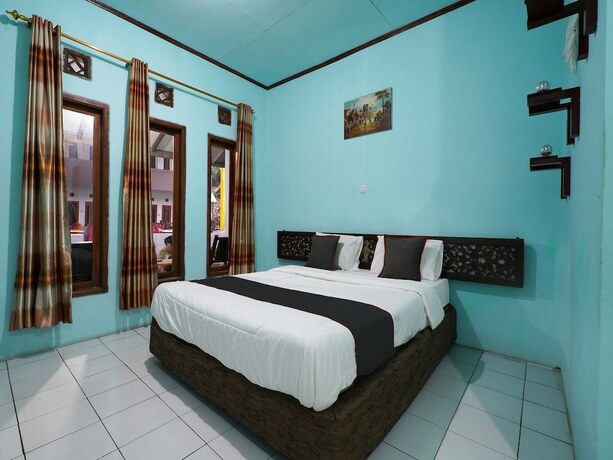Imagen de la habitación del Hotel Capital O 93262 Cherish 2. Foto 17