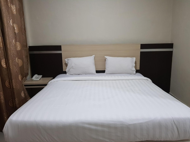 Imagen de la habitación del Hotel Capital O 93263 Linge Land. Foto 2