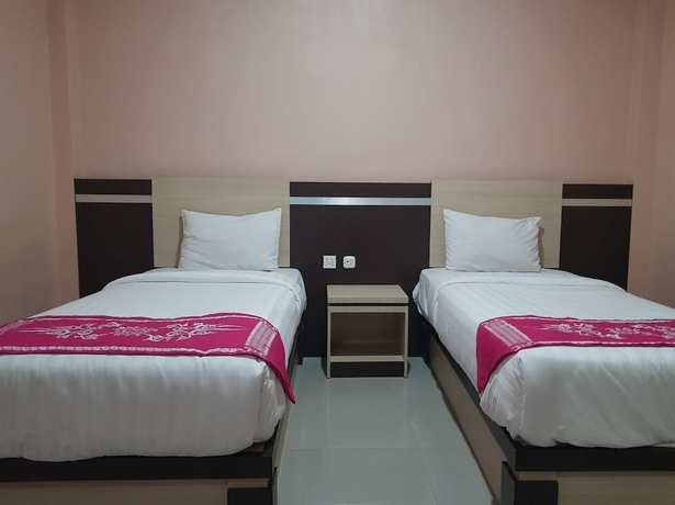 Imagen de la habitación del Hotel Capital O 93263 Linge Land. Foto 8