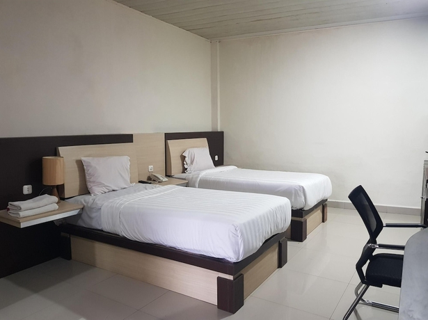 Imagen de la habitación del Hotel Capital O 93263 Linge Land. Foto 9