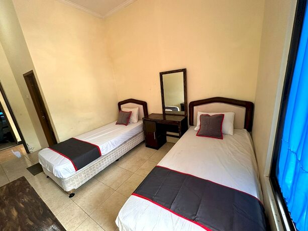 Imagen de la habitación del Hotel Capital O 93273 Rani Villa. Foto 20