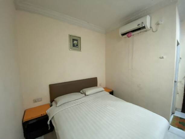 Imagen de la habitación del Hotel Capital O 93291 Bintang. Foto 13