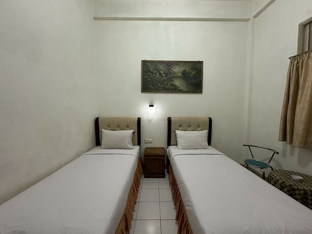 Imagen de la habitación del Hotel Capital O 93291 Bintang. Foto 14